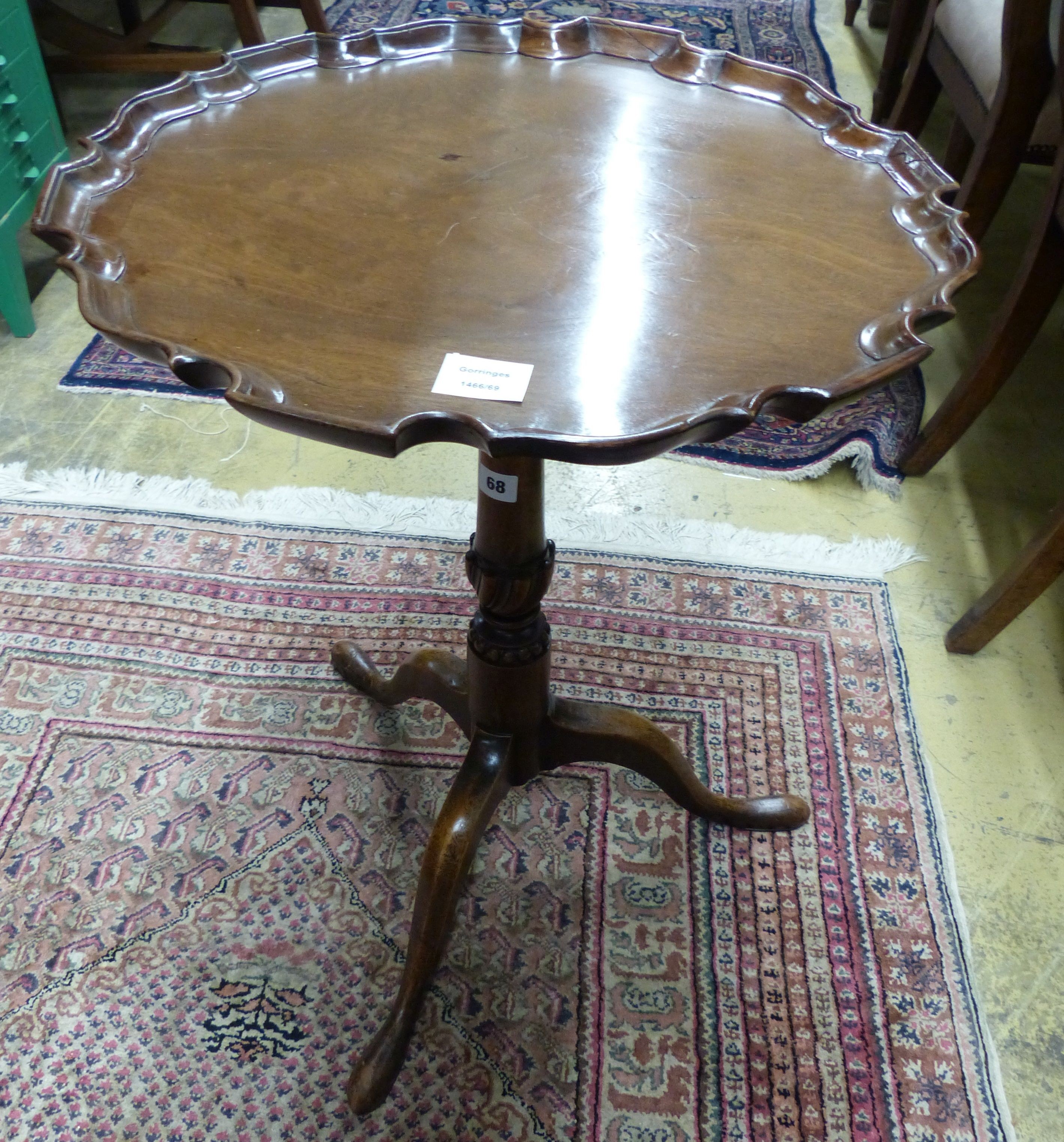 A George III and later mahogany tripod wine table, with piecrust top, Diam.50cm H.65cm